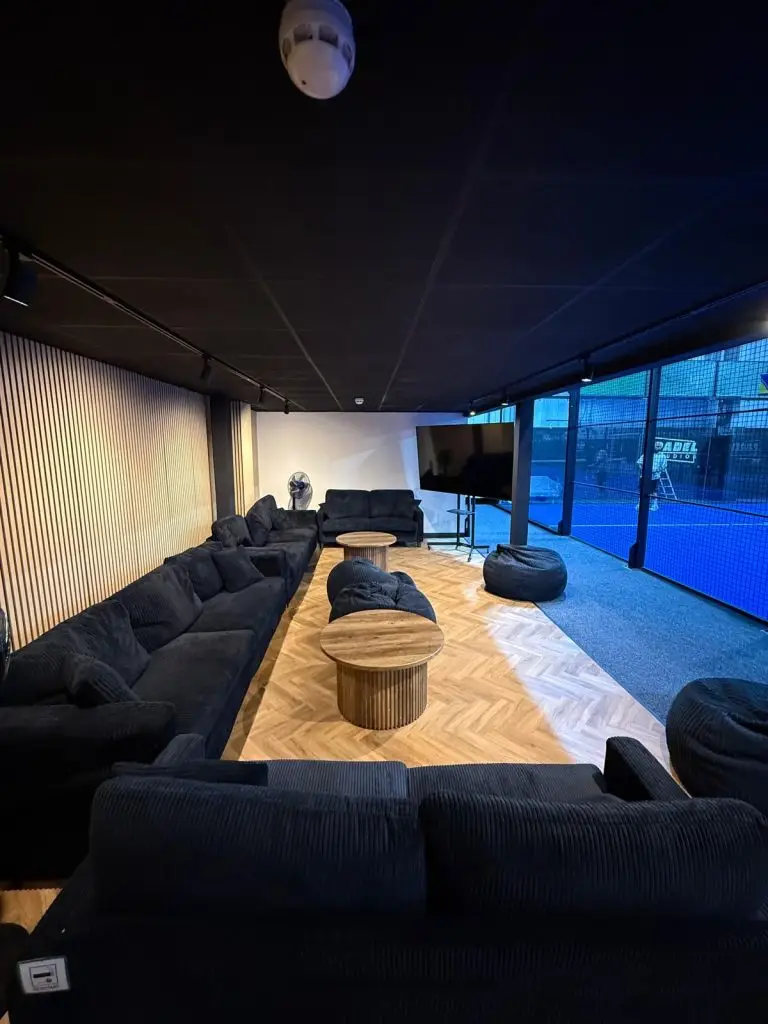 Completed commercial fit out with breakout seating and meeting tables